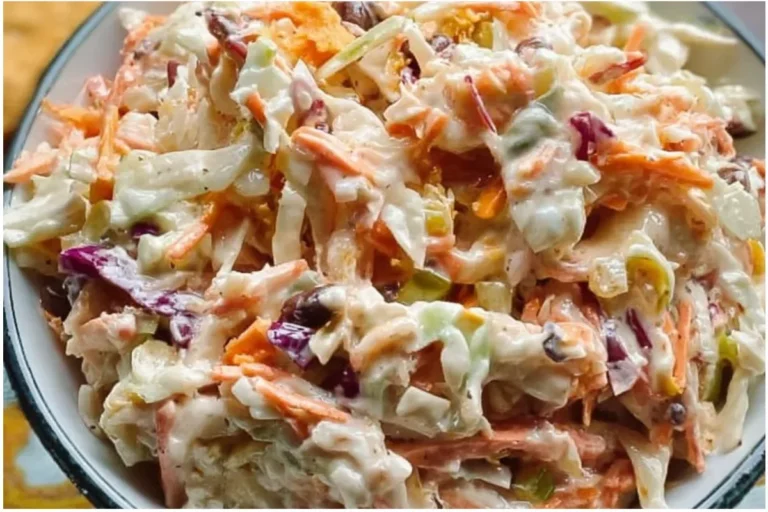 Flavor-packed coleslaw in a vibrant bowl, ready for serving at a summer barbecue.