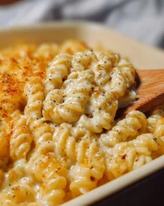 Creamy Boursin Mac and Cheese served in a bowl, garnished with herbs.